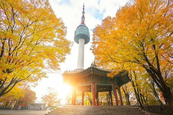 N Seoul Tower on Namsan above the autumn treeline